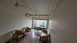 Living Room in 1 BHK Apartment at Gold Crown, Andheri West – for Sale