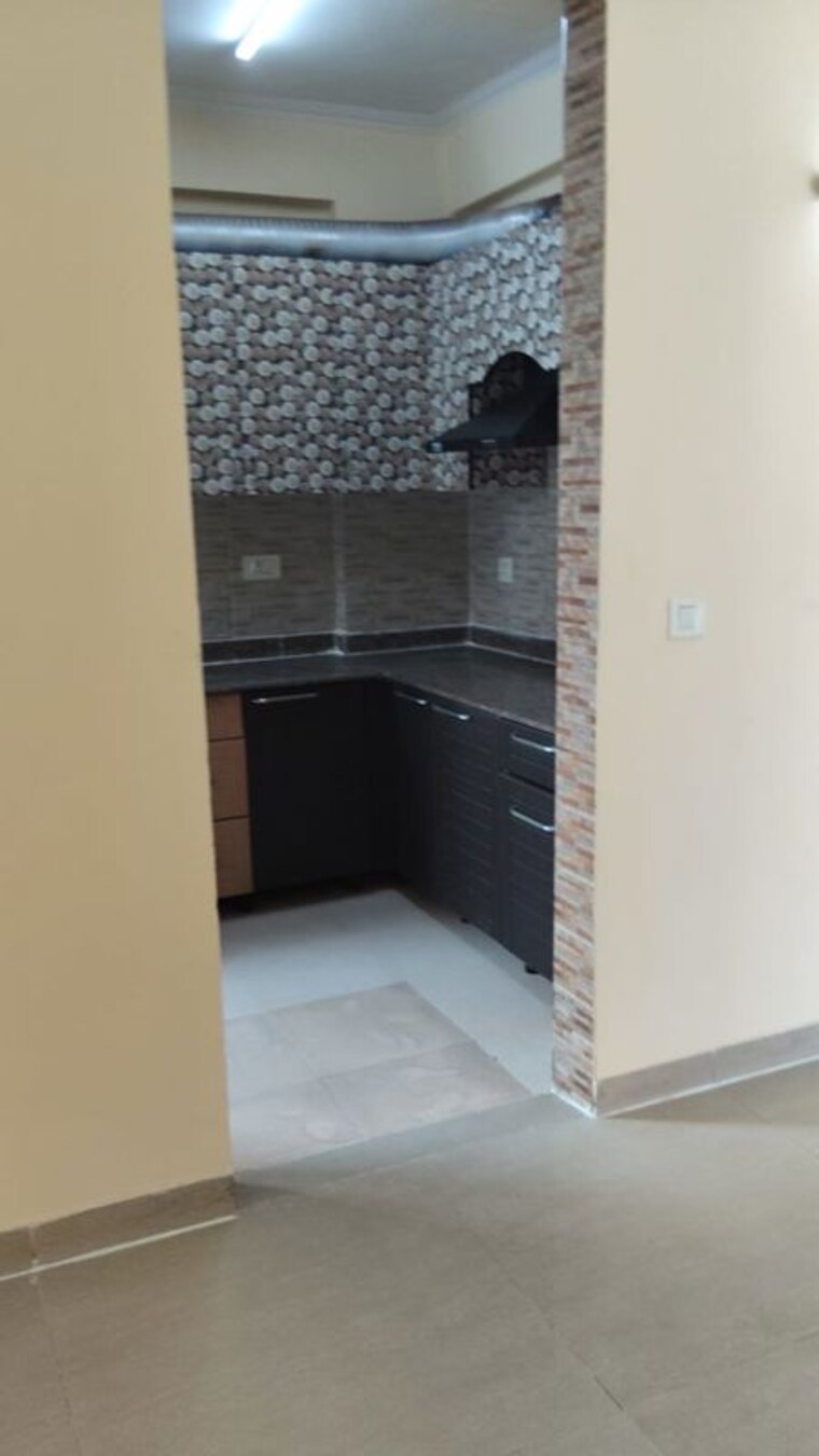 Kitchen, amrapali-eden-park 3 Bedroom 1360 Sq.Ft. Apartment In Sector 50 Noida 10214219
