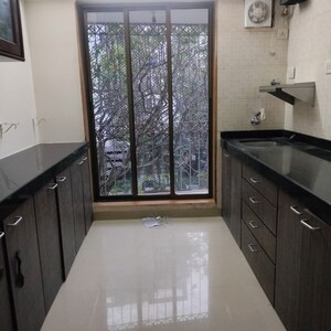 Kitchen in 2 BHK Apartment at Juhu Natraj CHS, Vile Parle West – for Rent
