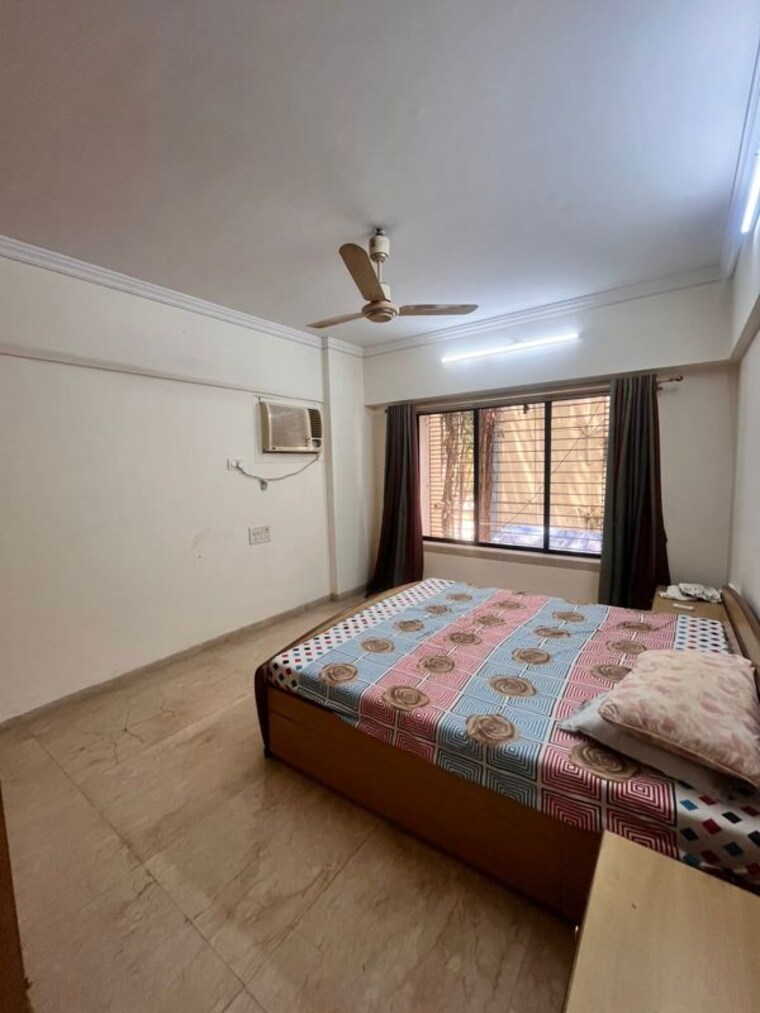 Bedroom, gulmohar road 2 Bedroom 700 Sq.Ft. Apartment In Gulmohar Road Mumbai 10214327