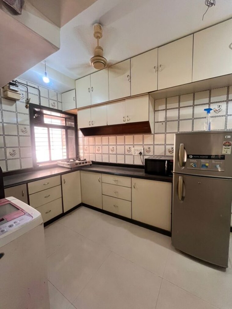 Kitchen, gulmohar road 2 Bedroom 700 Sq.Ft. Apartment In Gulmohar Road Mumbai 10214327