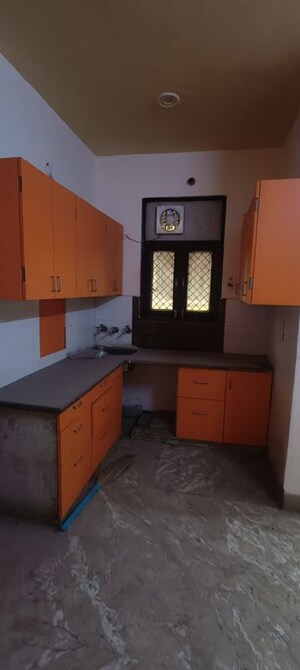 Kitchen in 1.5 BHK Builder Floor at Rohini Sector 25 – for Rent