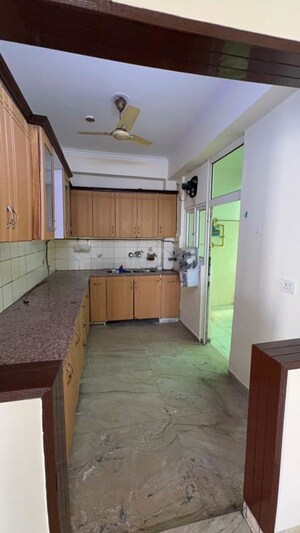Kitchen in 3 BHK Apartment at Mahagun Mansion I and II, Vaibhav Khand – for Rent