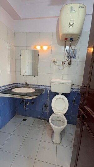 Bathroom in 3 BHK Apartment at Mahagun Mansion I and II, Vaibhav Khand – for Rent