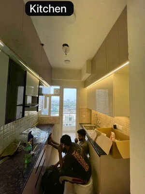 Kitchen in 3 BHK Apartment at Amrapali Crystal Homes, Sector 76 – for Rent