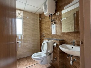 Bathroom in 4 BHK Apartment at Amrapali Crystal Homes, Sector 76 – for Rent