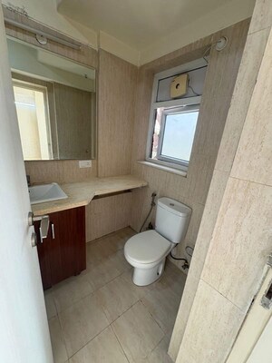 Bathroom in 3 BHK Apartment at DLF The Skycourt, Sector 86 – for Rent