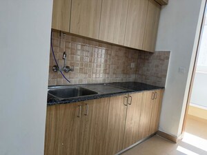Kitchen in 3 BHK Apartment at Amrapali Crystal Homes, Sector 76 – for Rent