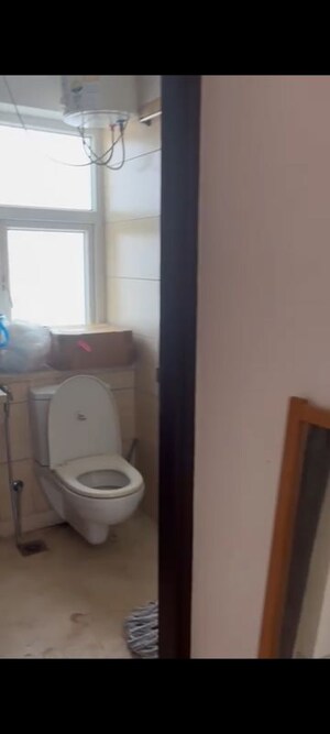 Bathroom in 3.5 BHK Apartment at Puri Diplomatic Greens Phase I, Sector 111 – for Rent