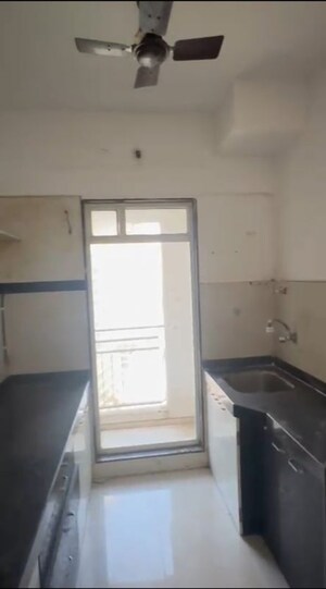 Kitchen in 2 BHK Apartment at JP North Estella, Mira Road – for Rent