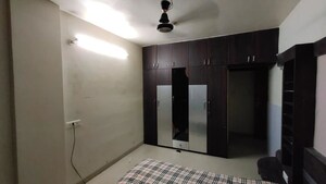 Bedroom in 3 BHK Apartment at Ayodhya Nagari CHS, Bopodi – for Rent