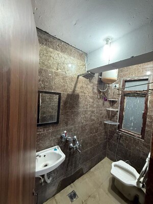 Bathroom in 1 RK Apartment at Emaar Emerald Estate, Sector 65 – for Sale