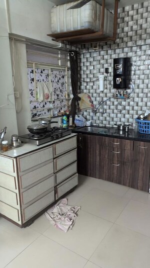Kitchen in 2 BHK Apartment at Shroff Signature Heights, Wakad – for Rent