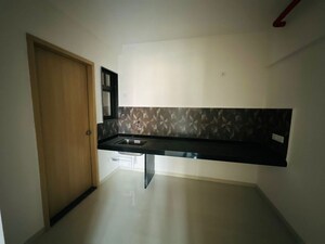 Kitchen in 3 BHK Apartment at Kohinoor Courtyard One, Wakad – for Rent