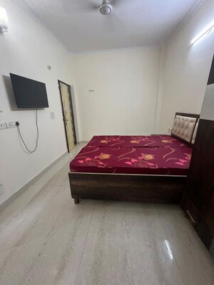 Bedroom in 1 RK Builder Floor at Ansal Sushant Shopping Arcade, Sector 27 – for Rent