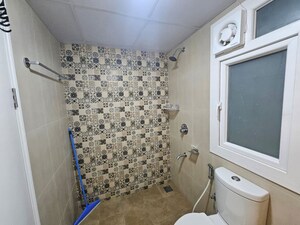 Bathroom in 1.5 BHK Apartment at Brigade El Dorado, Bagaluru – for Rent