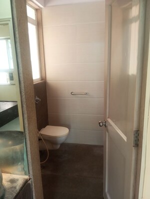 Bathroom in 2 BHK Apartment at Vijay Residency Phase III, Kavesar – for Sale