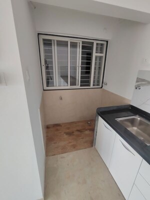 Kitchen in 2 BHK Apartment at Krishna Aviro, Mohammadwadi – for Rent