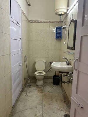 Bathroom in 3 BHK Builder Floor at Green Park – for Rent