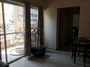 Living Room in 2 BHK Apartment at Kolte Patil Beryl, Kharadi – for Rent