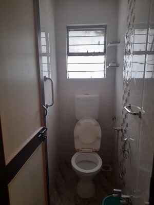 Bathroom in 2 BHK Apartment at Karve Nagar – for Rent