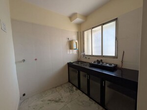 Kitchen in 1 BHK Apartment at Koldongri CHS, Andheri East – for Rent