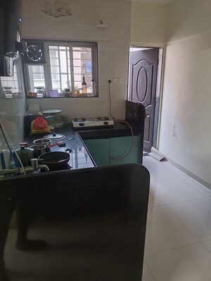 Kitchen in 2 BHK Apartment at Cassia CHS, Baner – for Sale