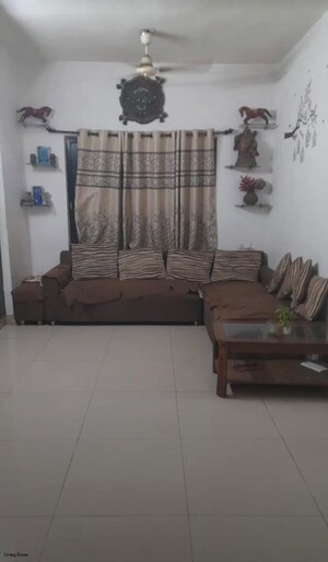 Living Room in 2 BHK Apartment at Gulmohar Queenstown, Kharadi – for Rent