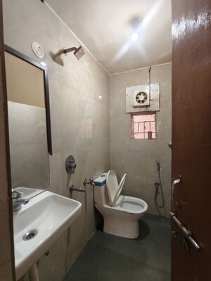 Bathroom in 2 BHK Apartment at Sector 6 Dwarka – for Rent