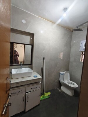 Bathroom in 2 BHK Apartment at Sector 6 Dwarka – for Rent