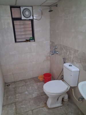 Bathroom in 2 BHK Apartment at Aarti Heights, Mohammadwadi – for Rent
