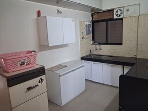 Kitchen in 2 BHK Apartment at Aarti Heights, Mohammadwadi – for Rent