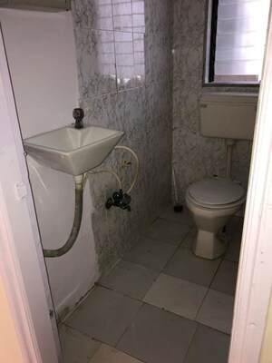 Bathroom in 1 BHK Apartment at Swati CHS, Andheri West – for Rent