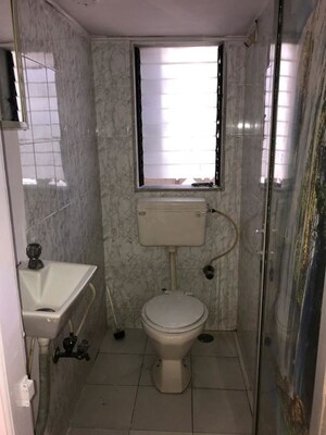 Bathroom in 1 BHK Apartment at Swati CHS, Andheri West – for Rent
