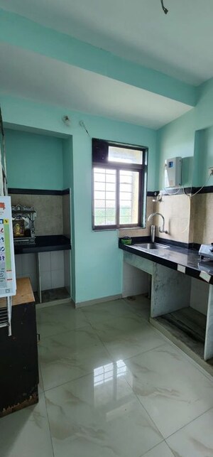 Kitchen in 2 BHK Apartment at Dss Mahavir Estella, Ghodbunder Road – for Rent