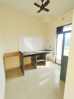 Kitchen in 1 BHK Apartment at Ram Pushpanjali Residency, Owale – for Rent