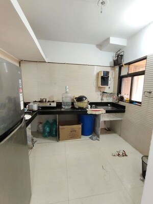 Kitchen in 2 BHK Apartment at Cosmos Jewels, Ghodbunder Road – for Rent
