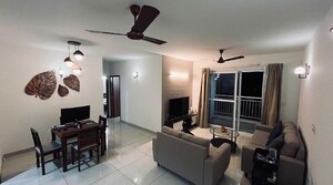 Living Room in 2 BHK Apartment at Puravankara Palm Beach, Hennur – for Rent