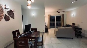 Living Room in 2 BHK Apartment at Puravankara Palm Beach, Hennur – for Rent