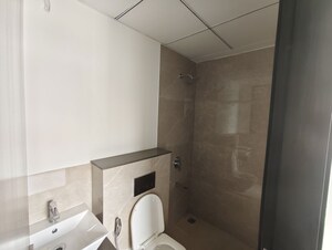 Bathroom in 1.5 BHK Apartment at Piramal Revanta Ravin, Mulund West – for Rent