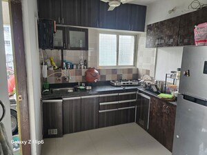 Kitchen in 2 BHK Apartment at KFP Chesterfield, Dhanori – for Rent