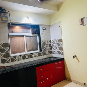 Kitchen in 1 BHK Apartment at Shraddha Evoque, Sonapur – for Rent