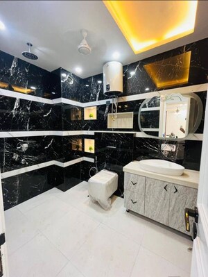 Bathroom in 4 BHK Builder Floor at Auram Floor, South City 2 – for Sale