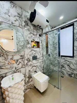 Bathroom in 4 BHK Builder Floor at Auram Floor, South City 2 – for Sale