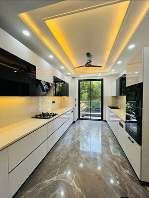 Kitchen in 4 BHK Builder Floor at Auram Floor, South City 2 – for Sale