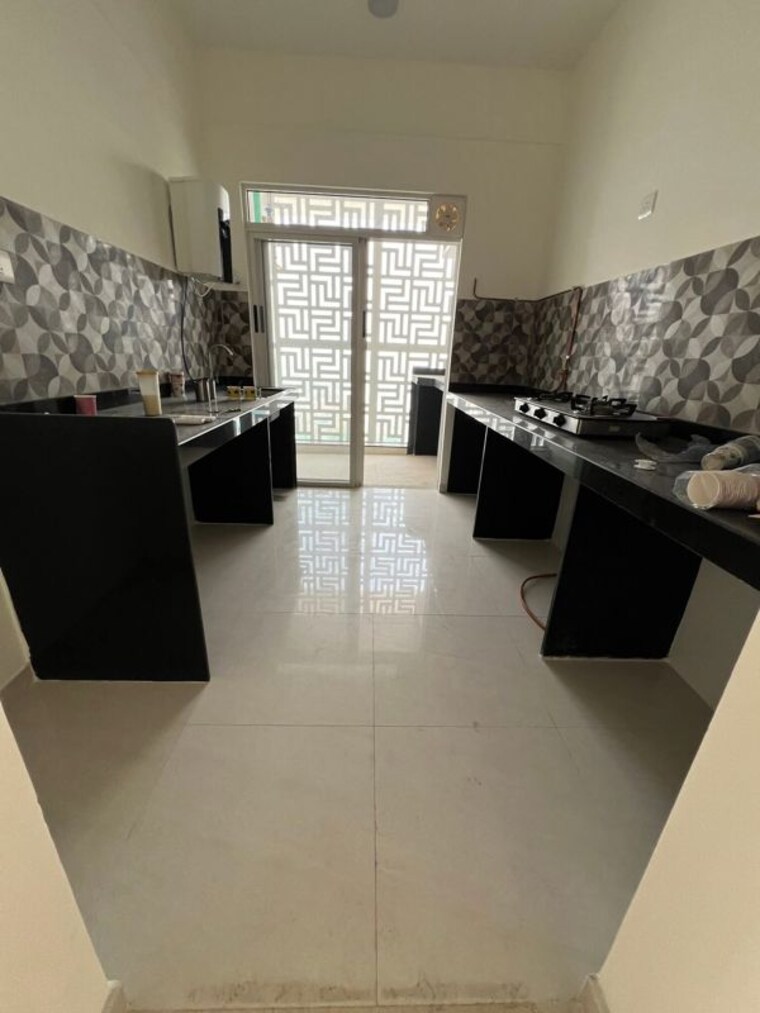 Kitchen, lodha-bella-vita 3.5 Bedroom 1850 Sq.Ft. Apartment In Nibm Road Pune 10216778