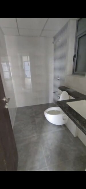 Bathroom in 2 BHK Apartment at Kalpataru Elitus, Mulund West – for Rent