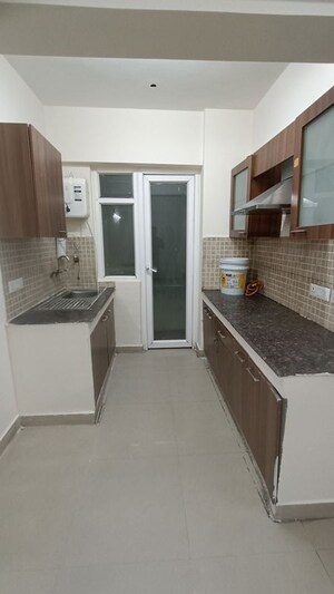 Kitchen in 2 BHK Apartment at Sethi Max Royal, Sector 76 – for Rent