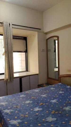 Room in 2 BHK Apartment at Jayshree CHS Malad West, Malad West – for Rent