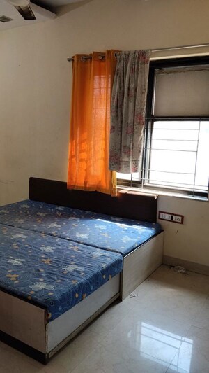 Bedroom in 2 BHK Apartment at Jayshree CHS Malad West, Malad West – for Rent